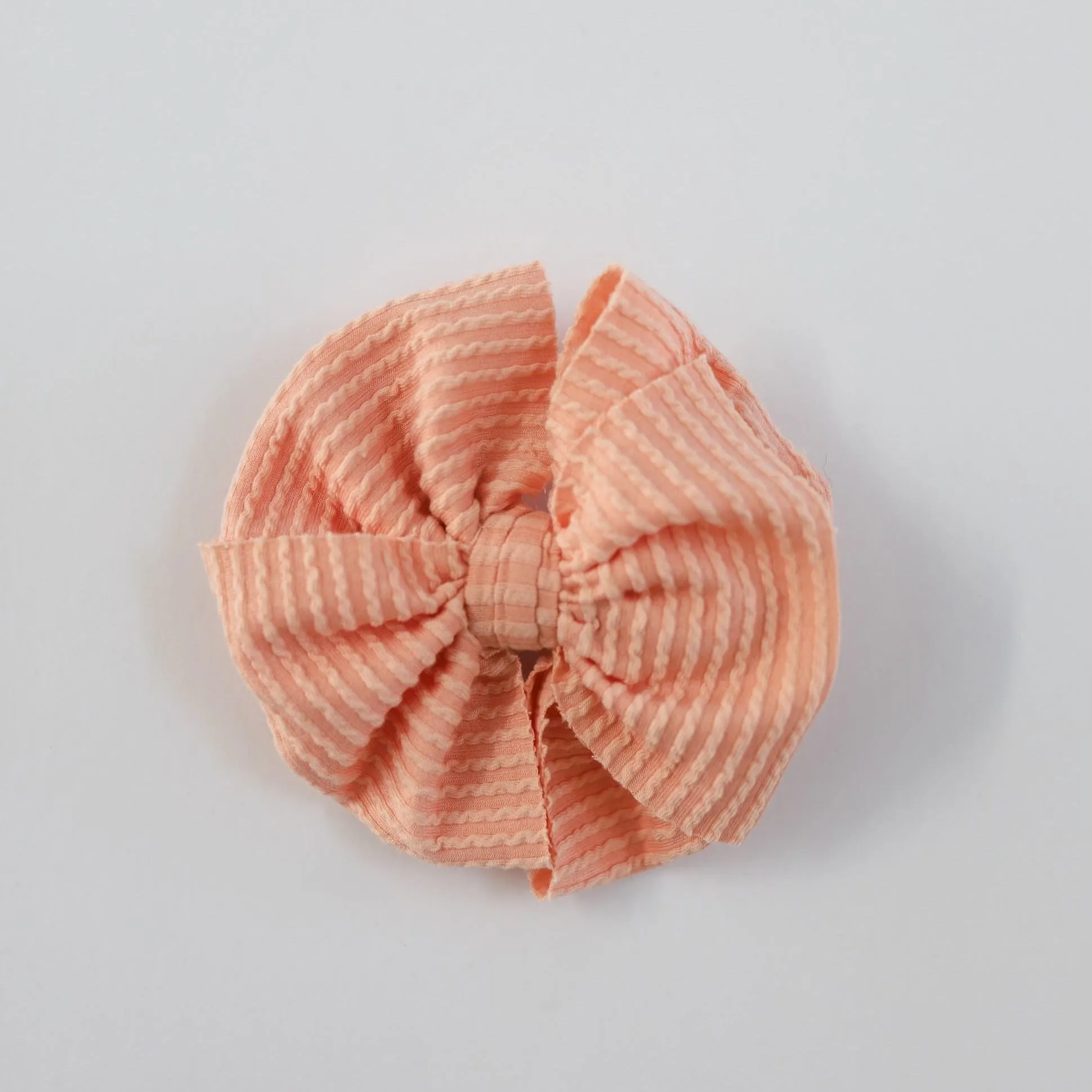 Cozy Ribbed Peach Bow