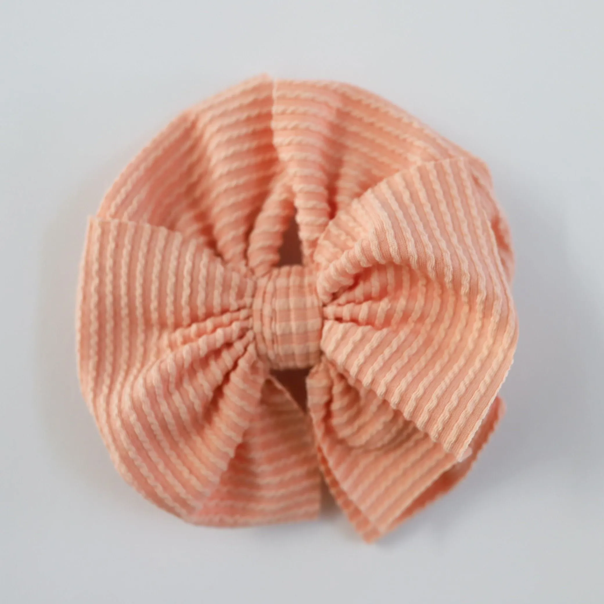 Cozy Ribbed Peach Bow